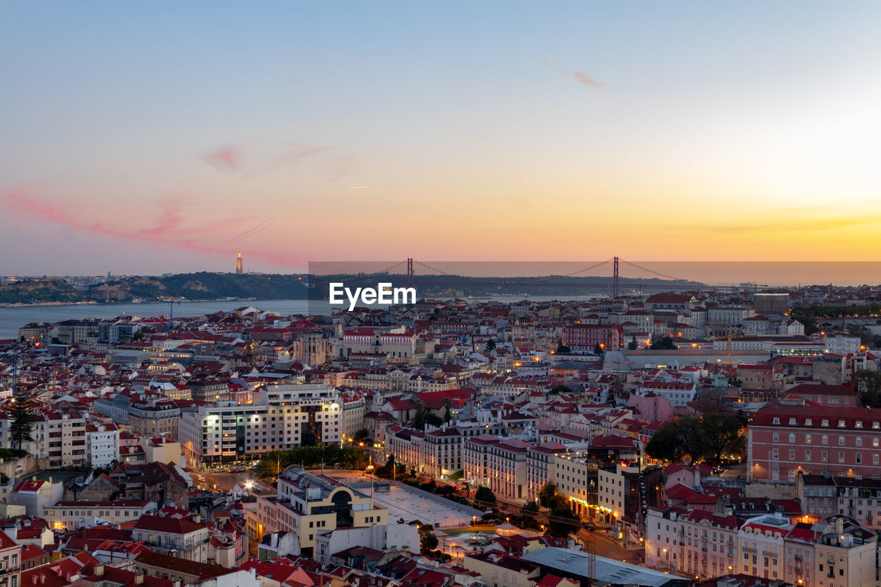 High angle view of townscape against sky during sunset