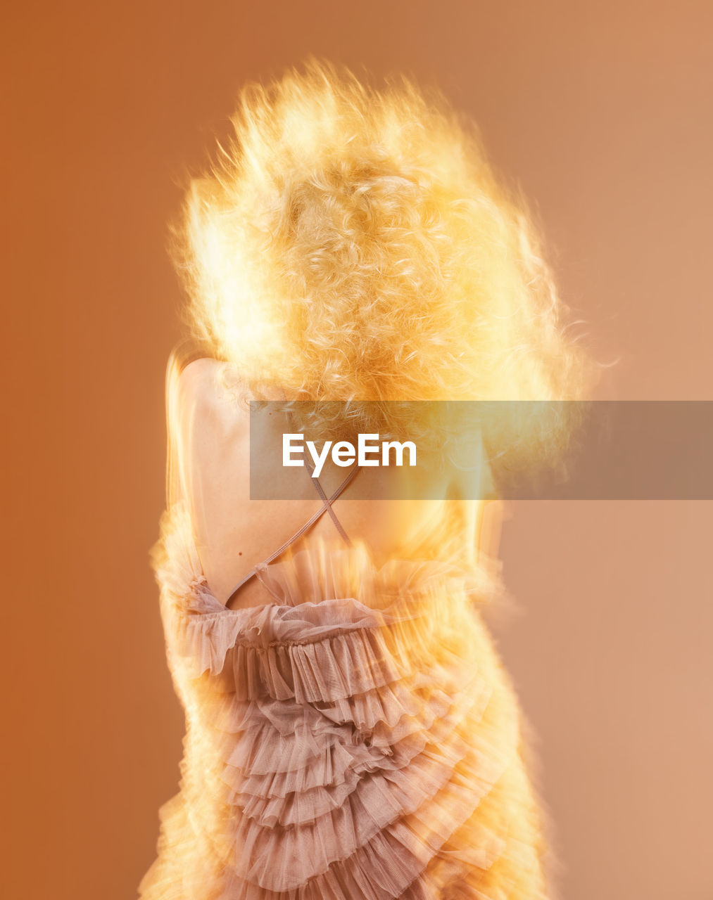 yellow, studio shot, colored background, adult, one person, close-up, blond hair, fur, hairstyle, portrait, human hair, women, clothing, indoors, fashion, human head, headshot, skin, young adult, copy space, curly hair, hand, nose