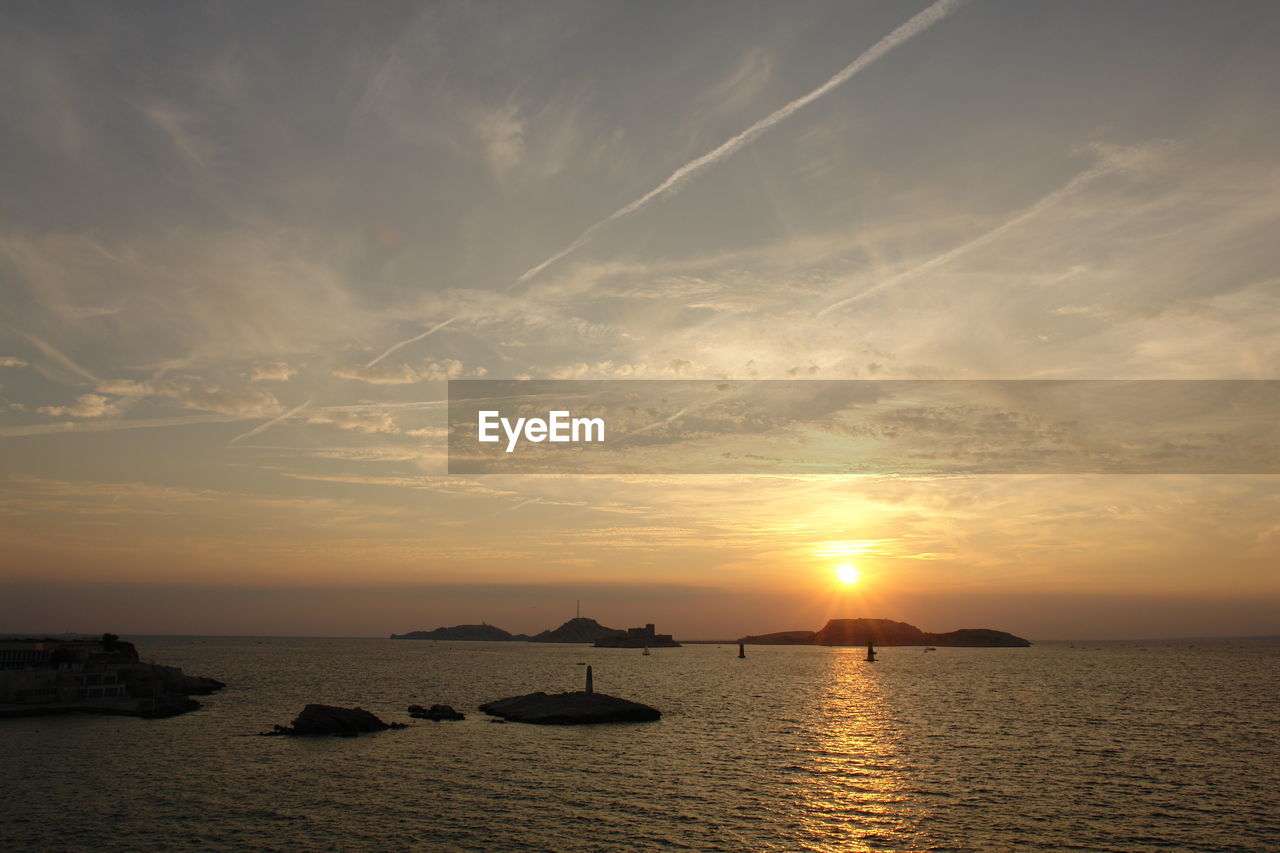 VIEW OF SEA AGAINST SKY DURING SUNSET