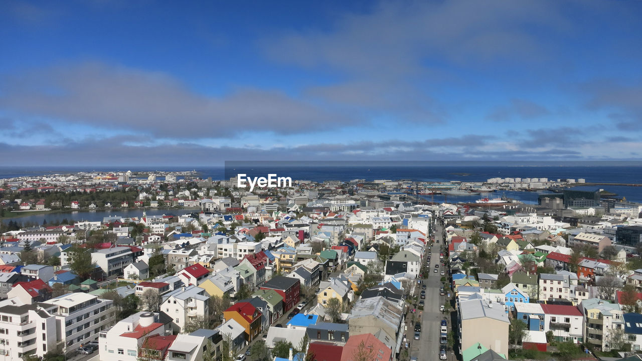 PANORAMIC VIEW OF CITYSCAPE AGAINST SKY