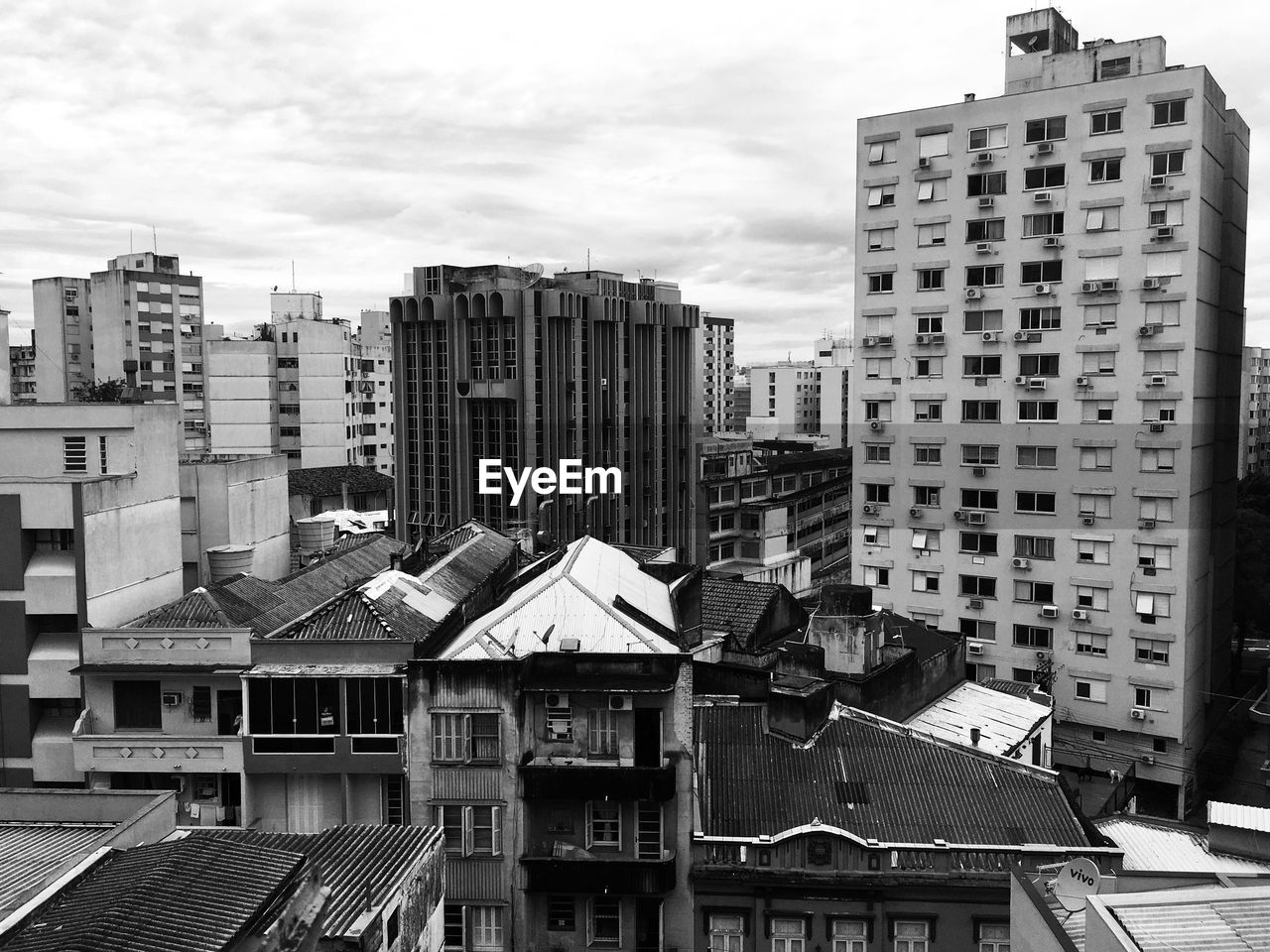 High angle view of buildings in city against sky