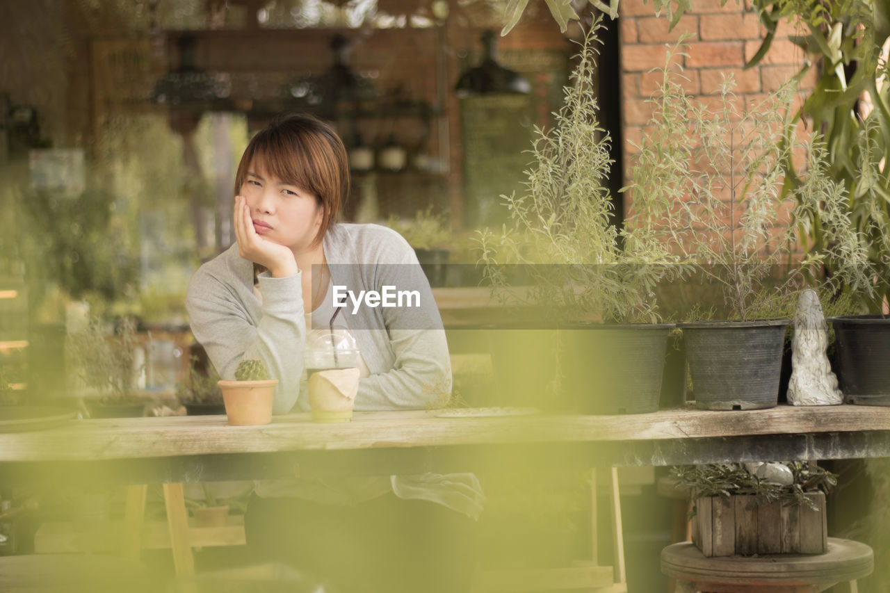 Young woman at outdoor cafe