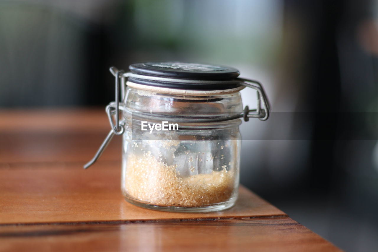 Close-up of jar on table