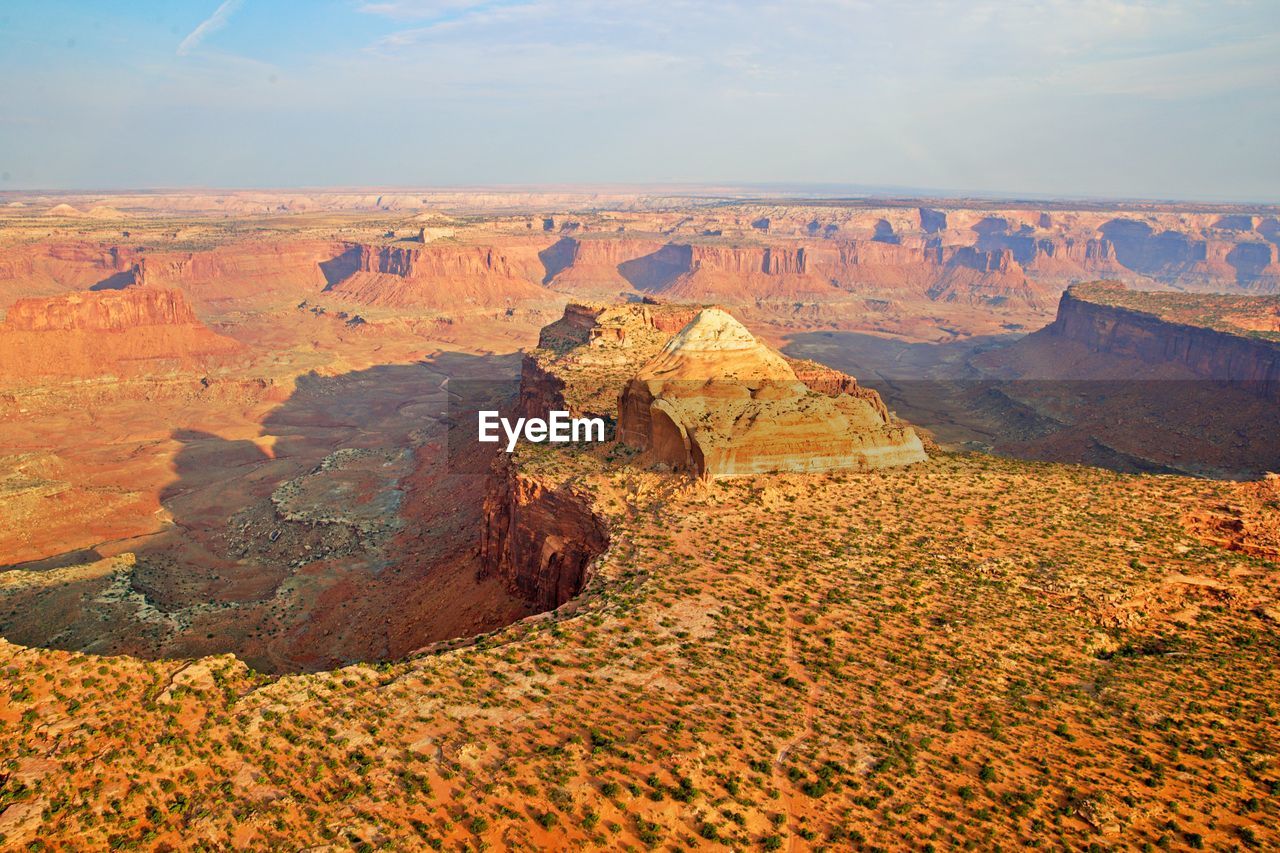 SCENIC VIEW OF ROCK FORMATIONS IN CANYON