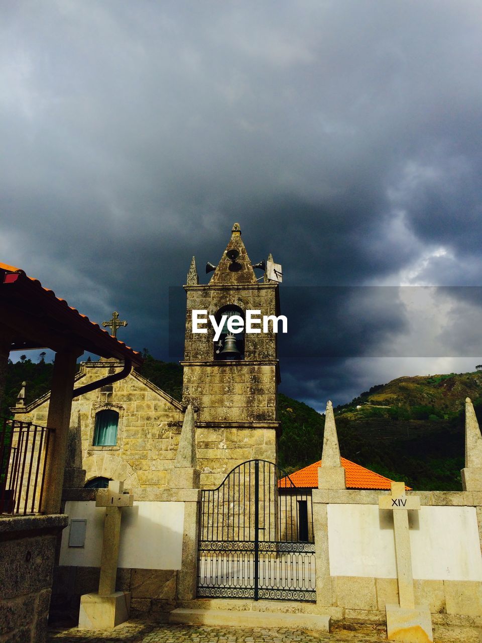 BUILT STRUCTURES AGAINST CLOUDY SKY