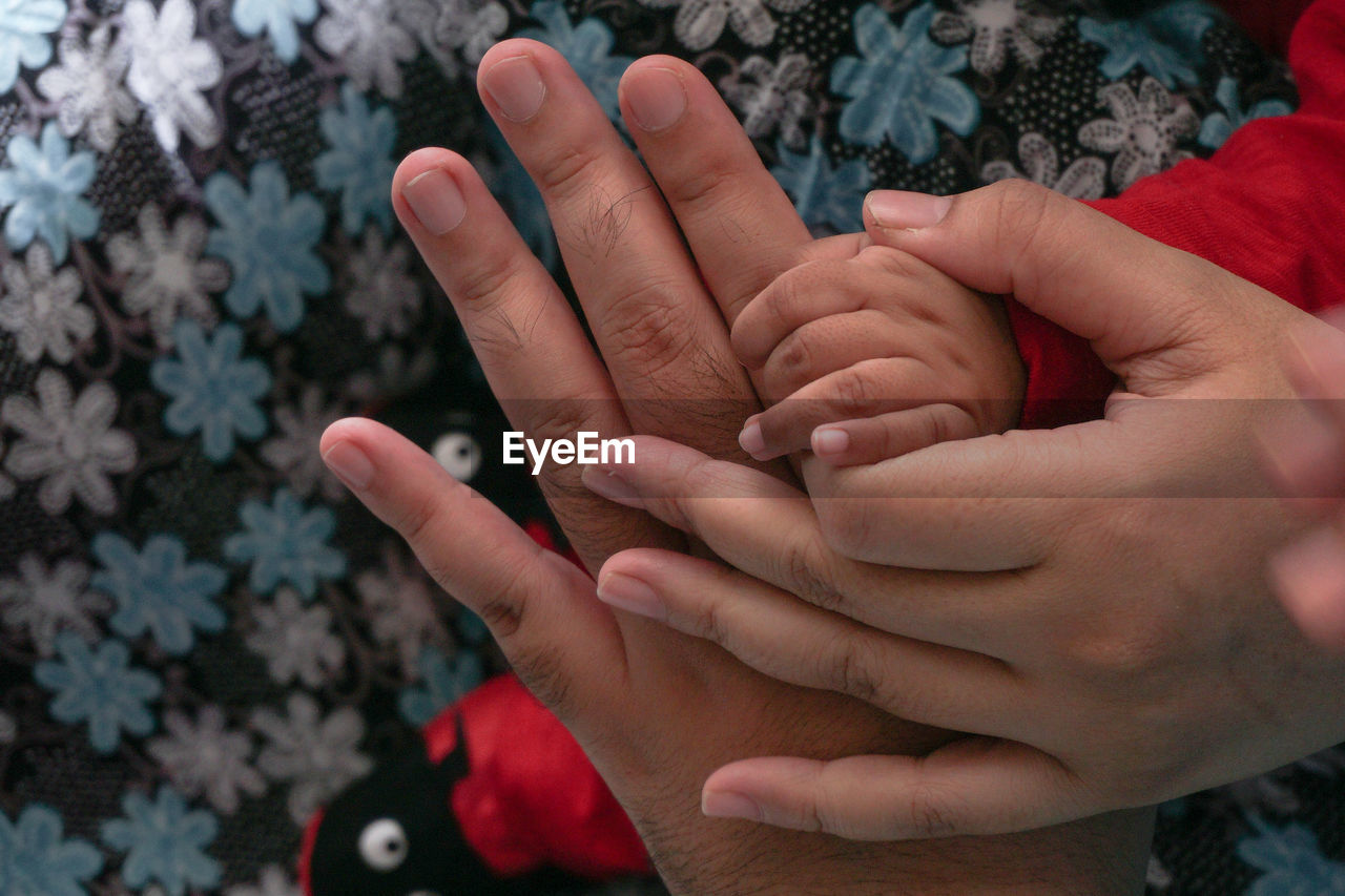 CLOSE-UP OF HANDS