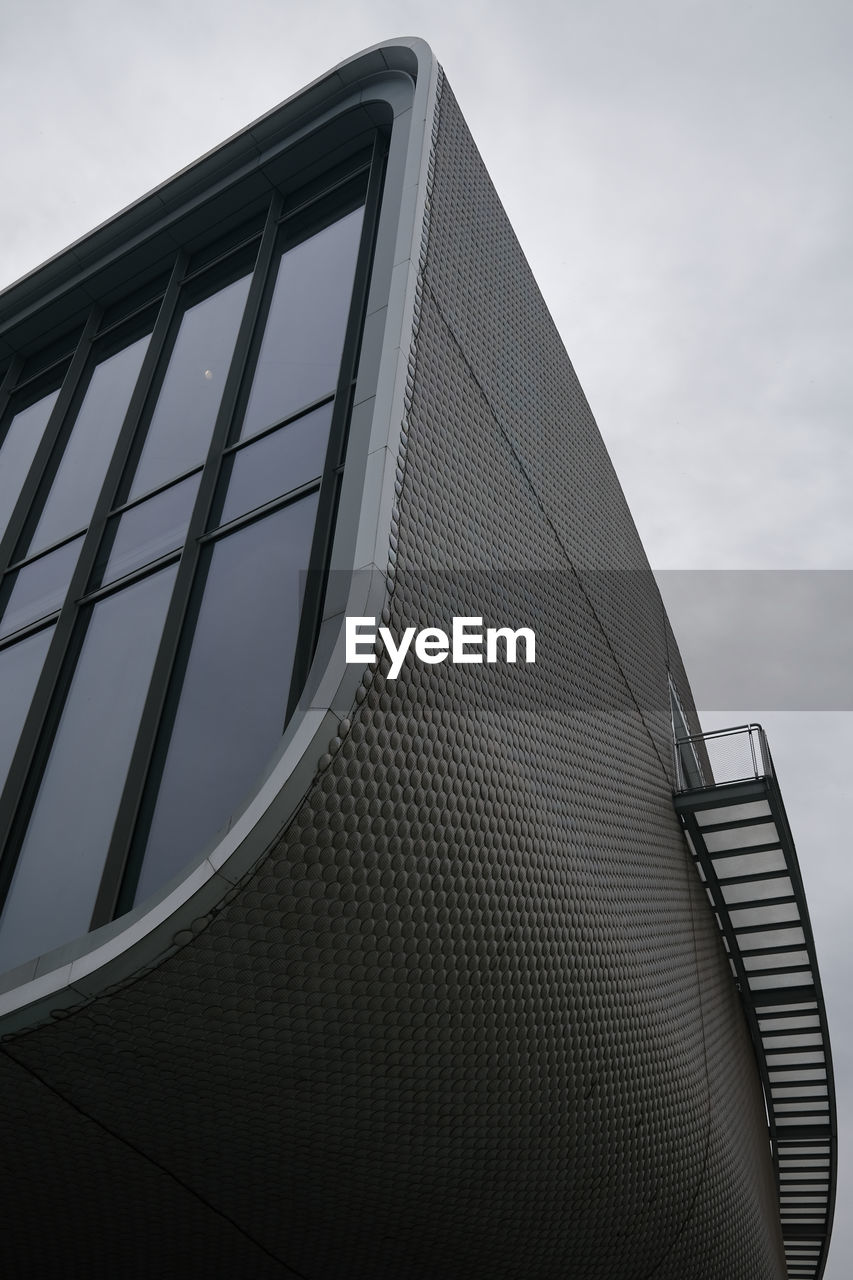 architecture, built structure, sky, building exterior, cloud, low angle view, city, building, black, no people, nature, monochrome, skyscraper, futuristic, outdoors, office building exterior, business, glass, day