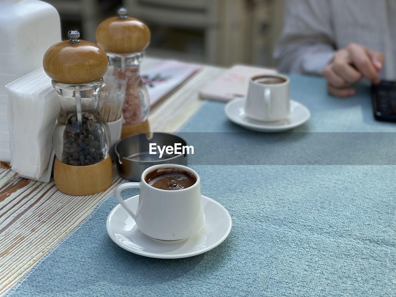 Close-up of coffee cup on table