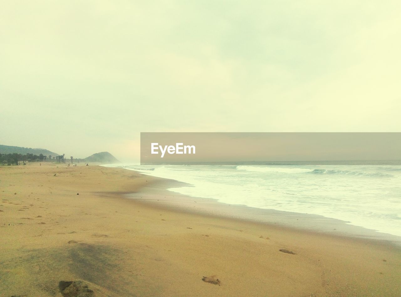 VIEW OF BEACH AGAINST SKY