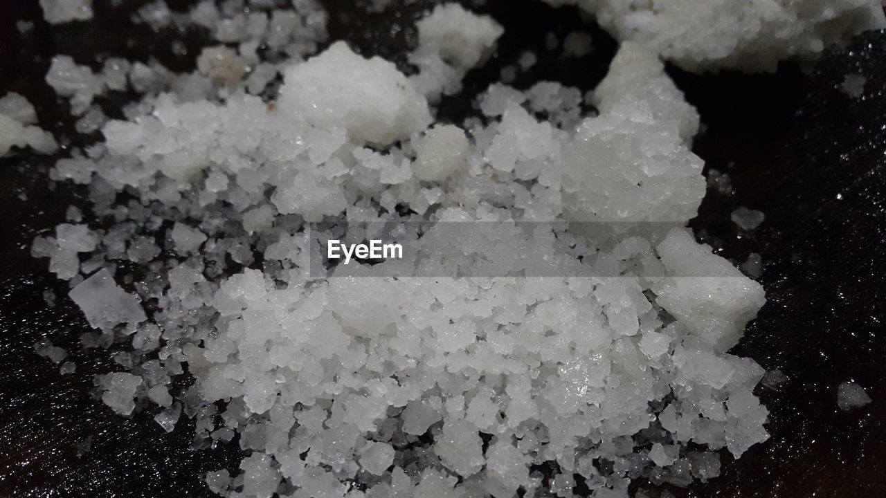 HIGH ANGLE VIEW OF ICE CREAM ON SNOW