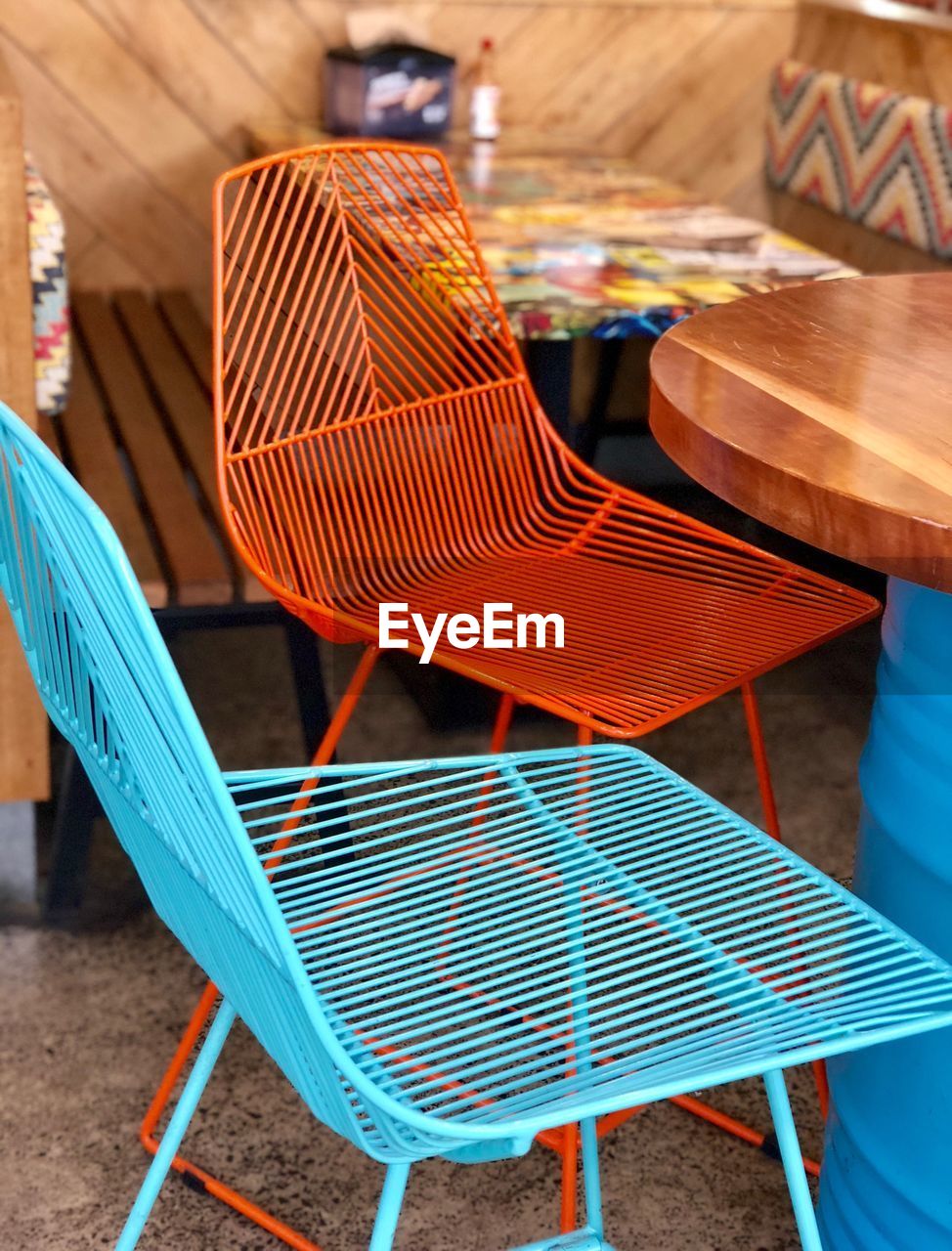 High angle view of empty chairs and table