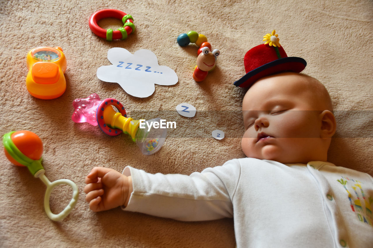 CUTE BOY WITH TOYS