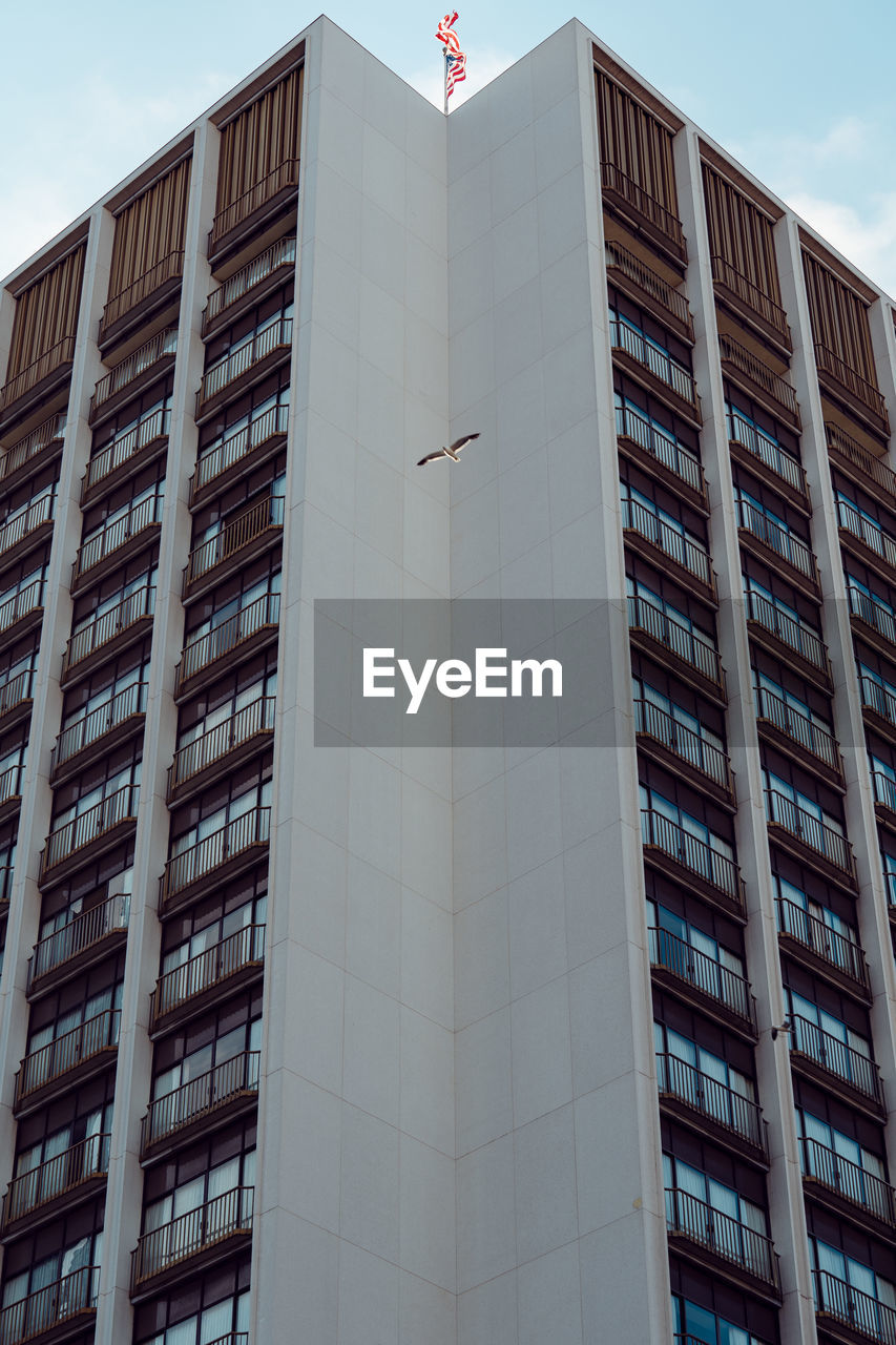 Low angle view of modern building against sky