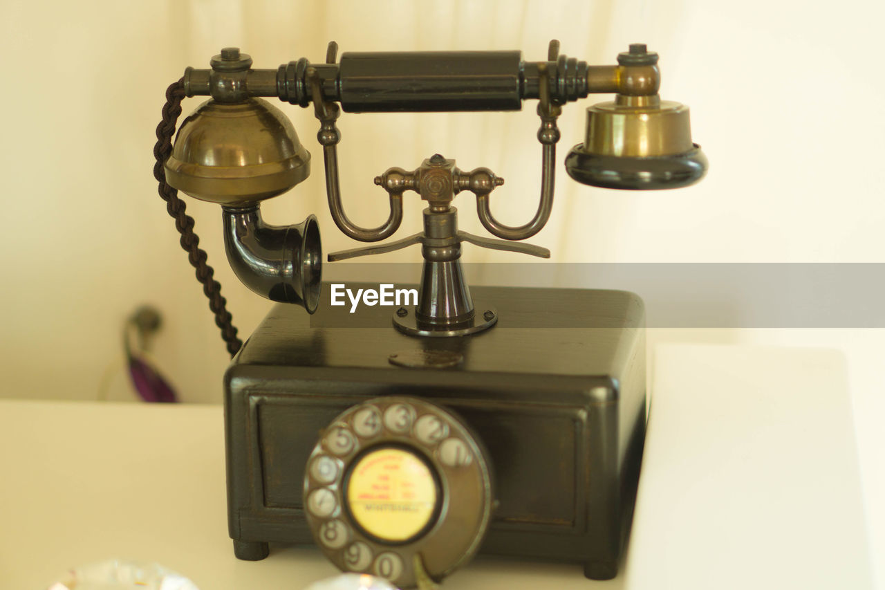 CLOSE-UP OF OLD TELEPHONE BOOTH