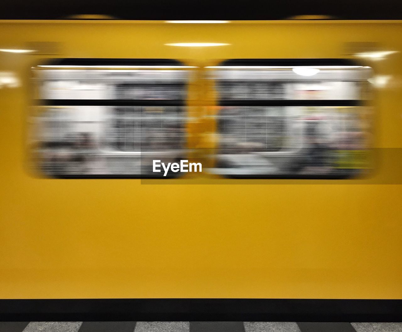 View of blurred yellow train