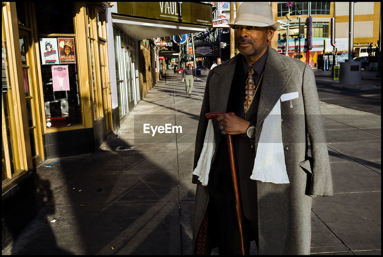 MAN WALKING ON STREET