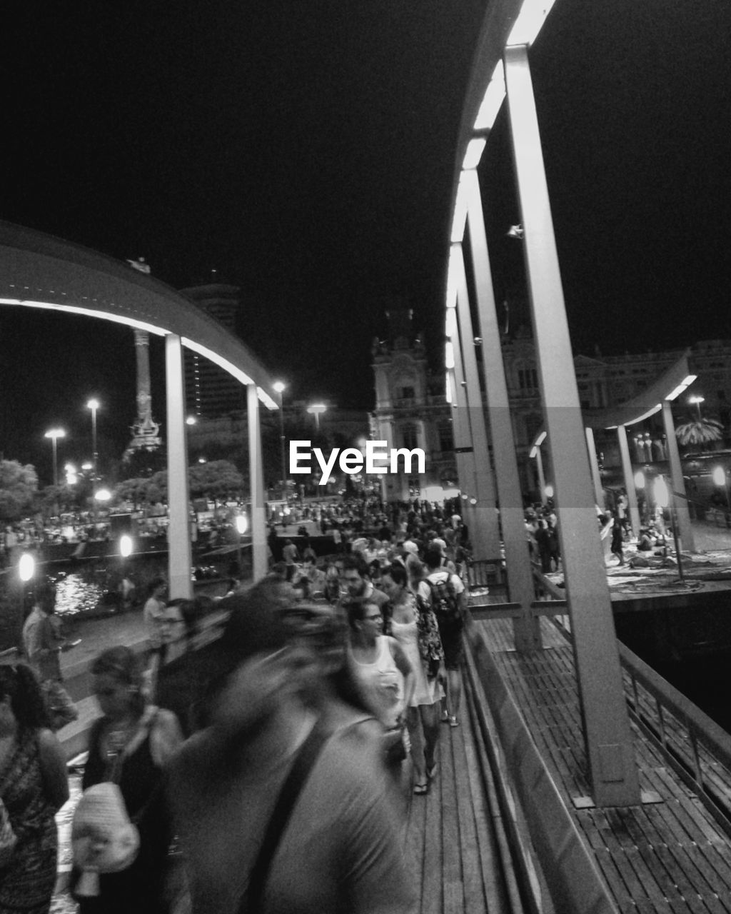 BLURRED MOTION OF CARS ON ROAD AT NIGHT