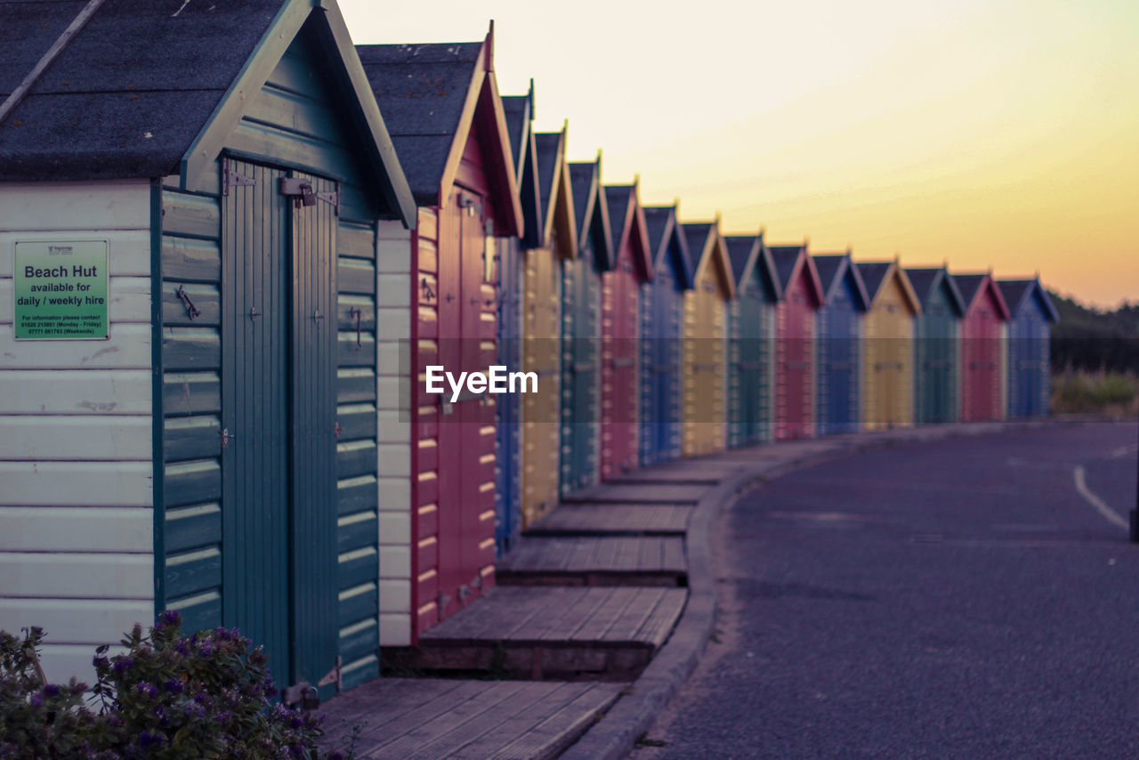 Beach huts and sunset