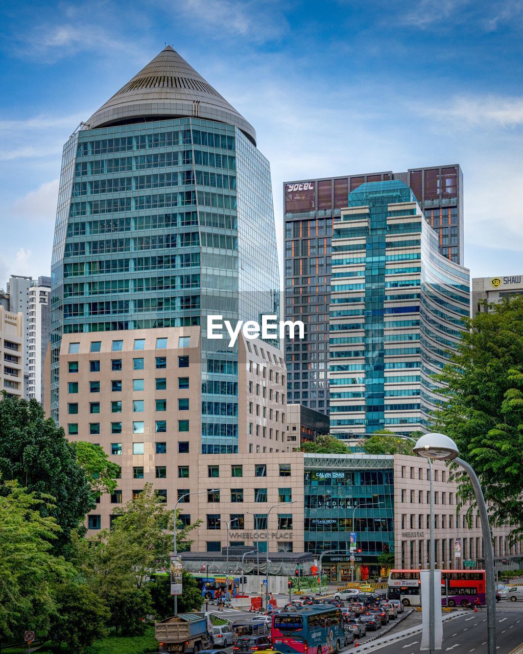 VIEW OF BUILDINGS IN CITY AGAINST SKY