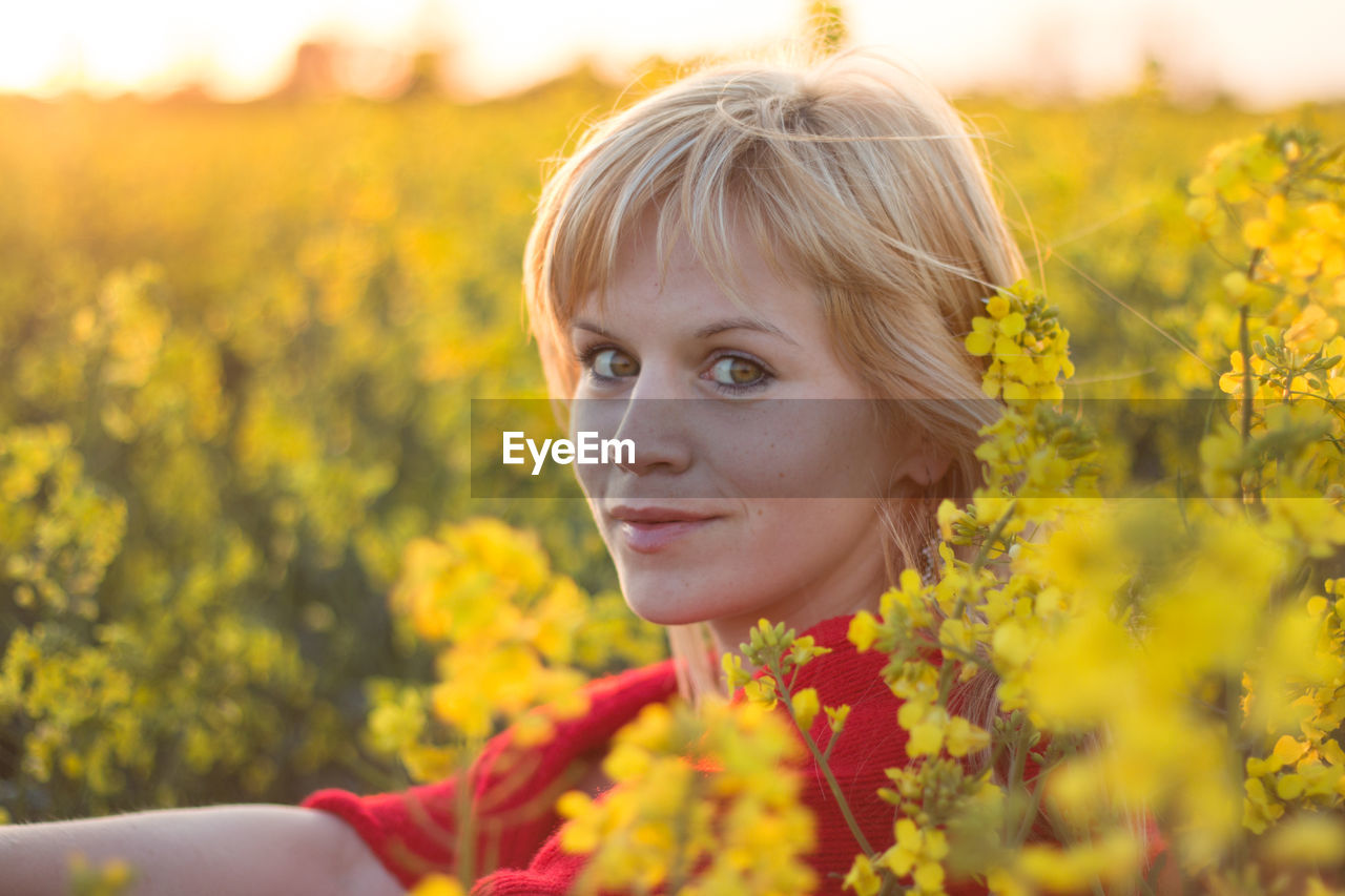 Portrait of beautiful young woman in rap field