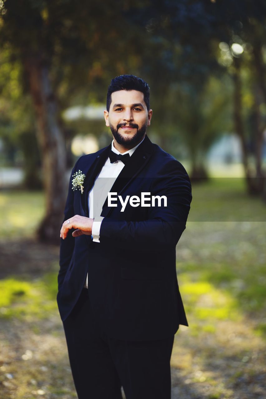 Portrait of smiling groom