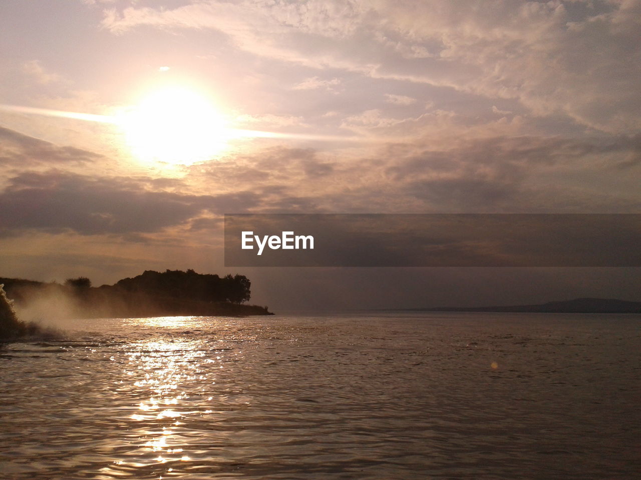 SCENIC VIEW OF SEA DURING SUNSET