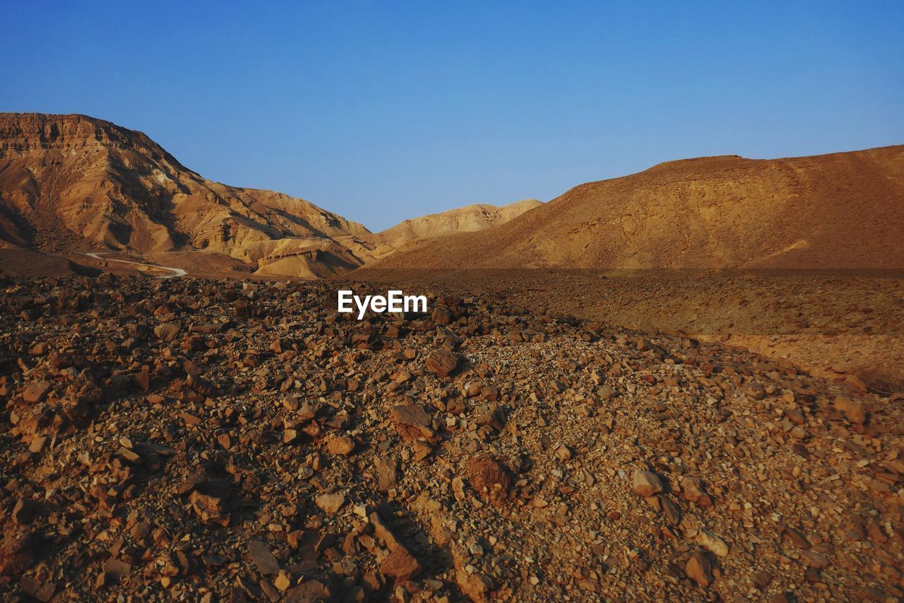 Scenic view of mountains against clear sky