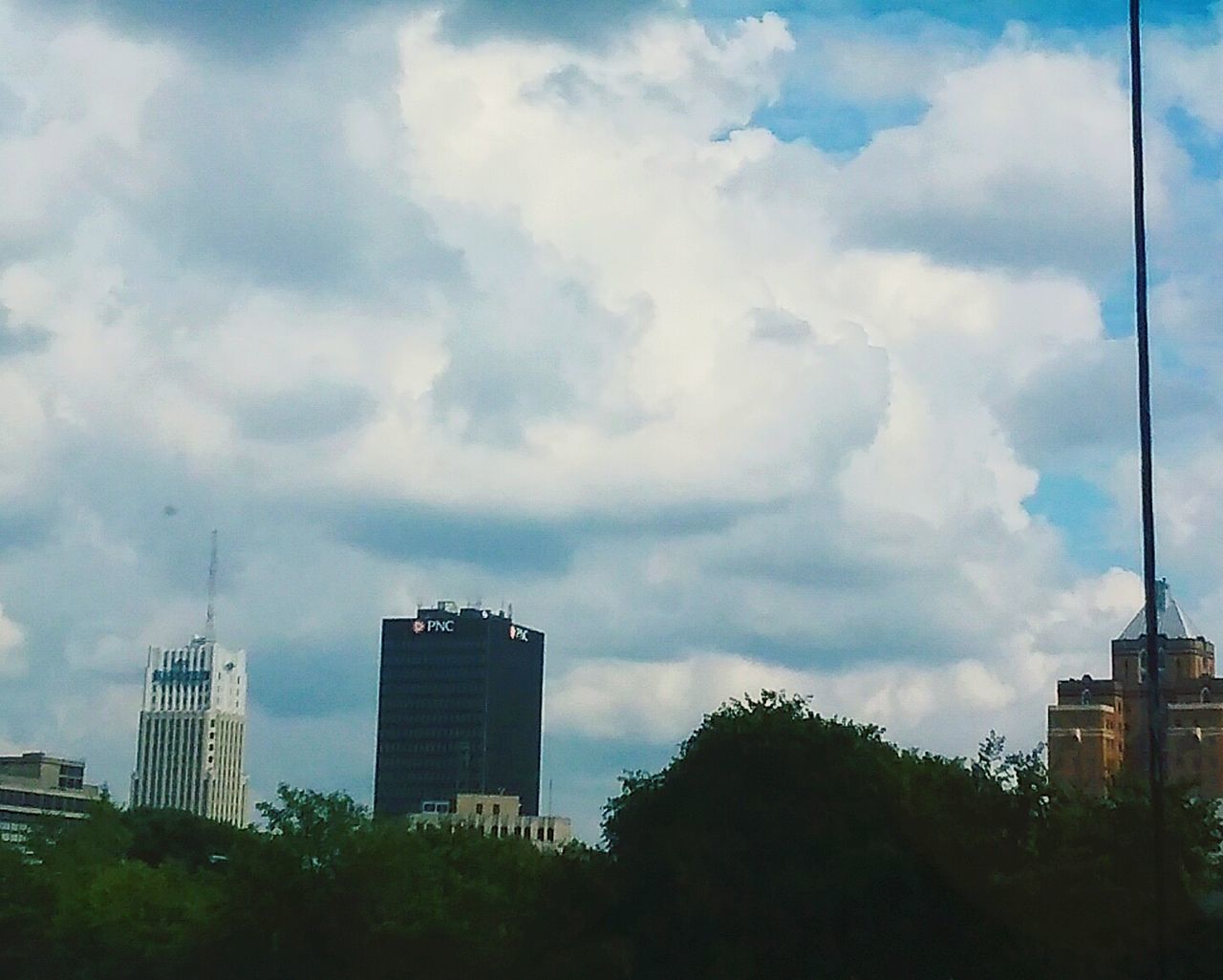 HIGH SECTION OF BUILDINGS AGAINST SKY