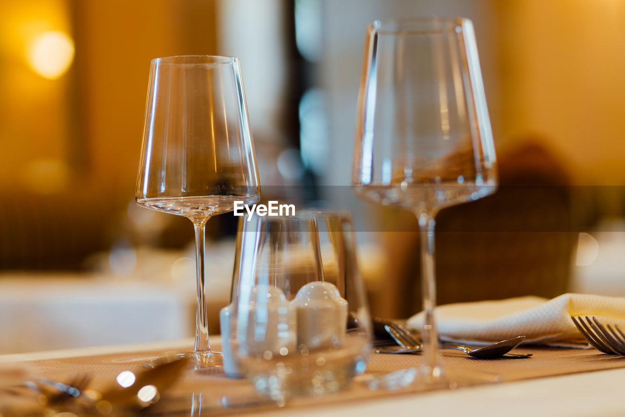close-up of wineglass on table at restaurant