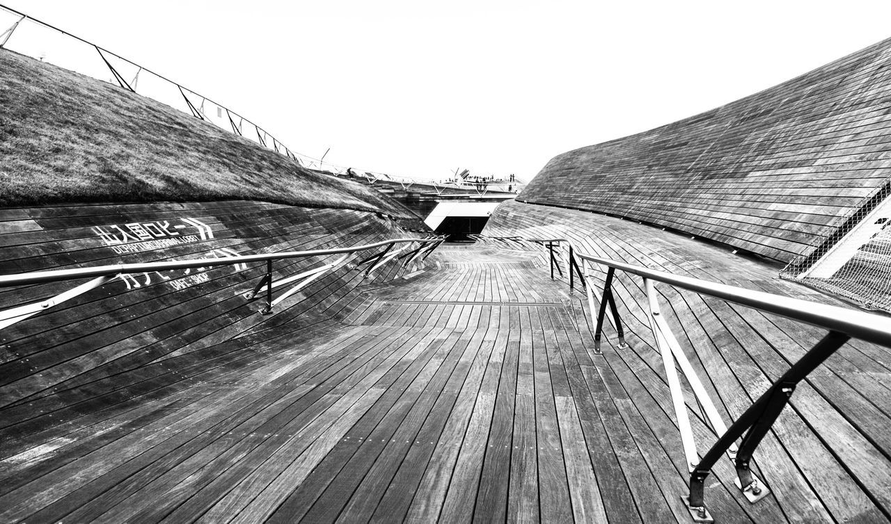 Wooden walkway at harbor