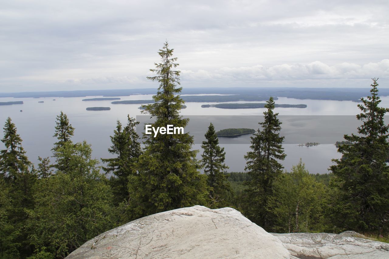 Scenic view of sea against cloudy sky