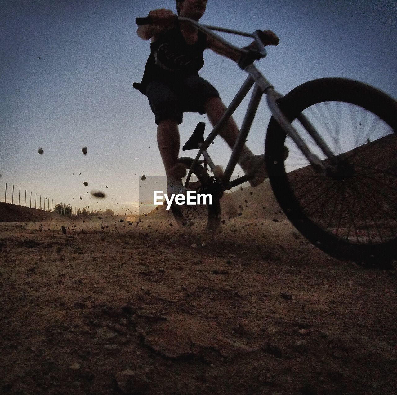 SILHOUETTE BICYCLE AGAINST CLEAR SKY