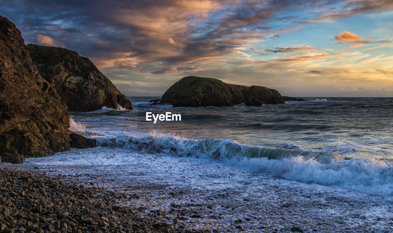 Scenic view of sea against sky during sunset