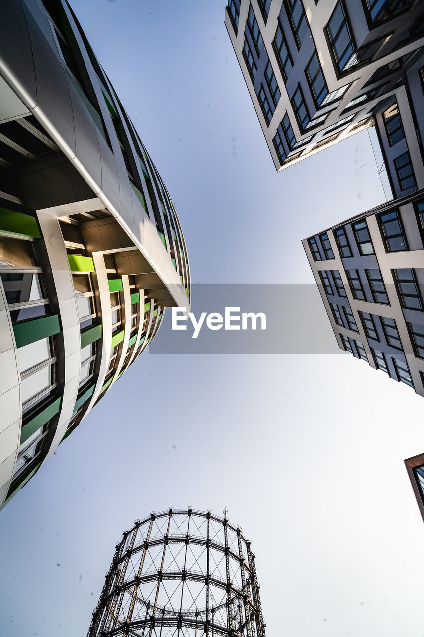 Low angle view of modern buildings against clear sky