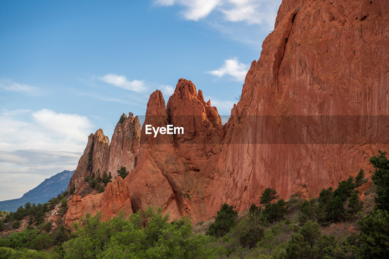 Panoramic view of rock formations against sky