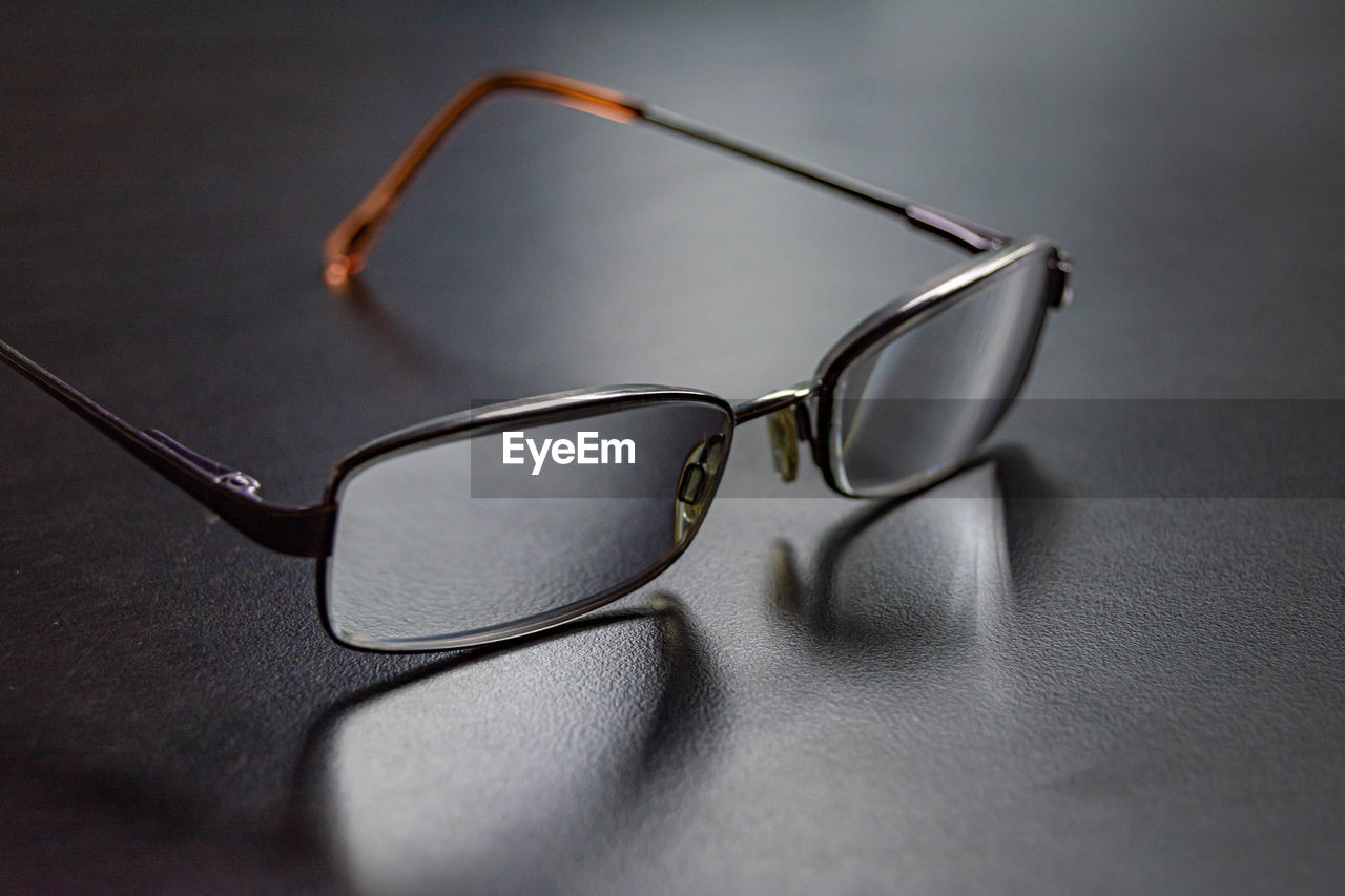 Close-up of eyeglasses on table