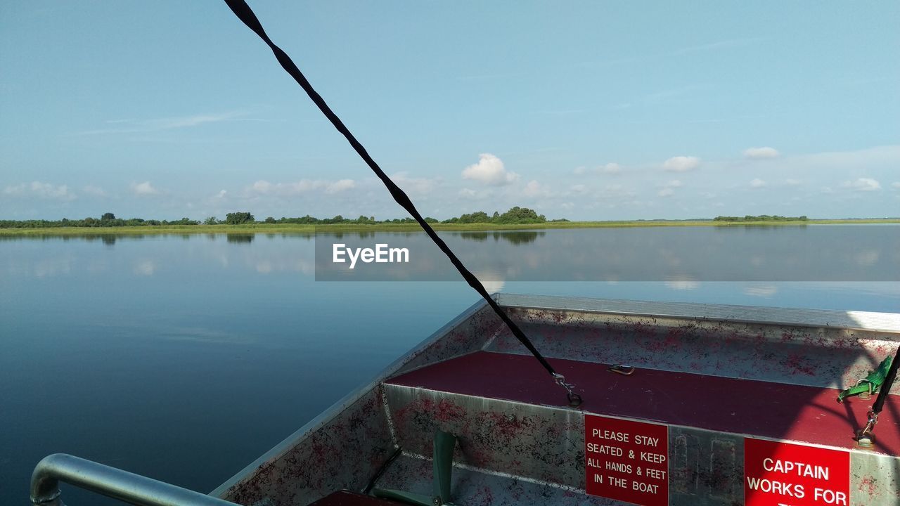 VIEW OF BOATS IN RIVER