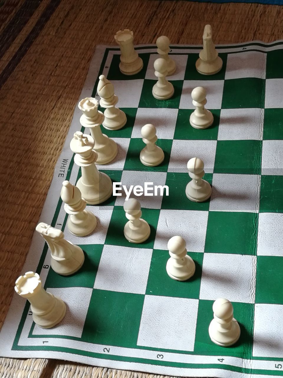 High angle view of chess pieces on table