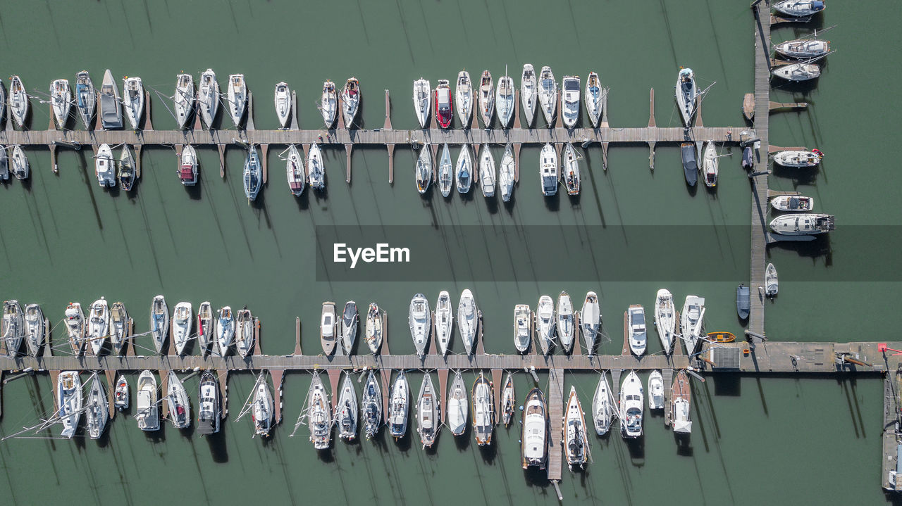 Directly above shot of boats moored on lake