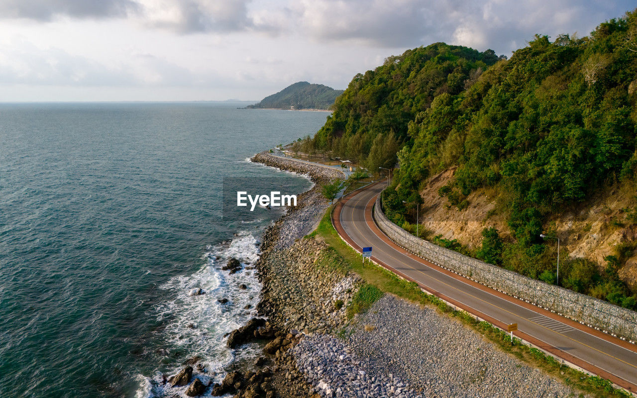 high angle view of road by sea against sky