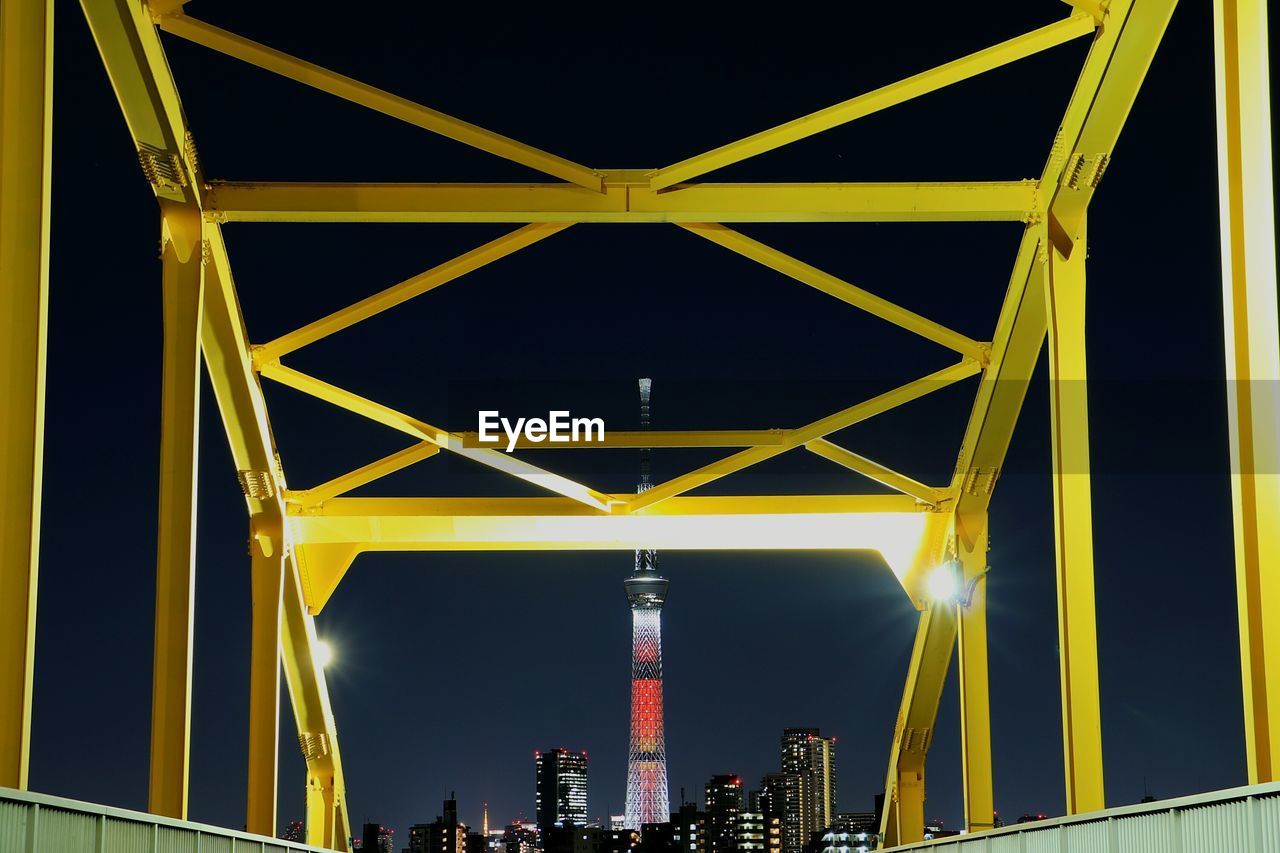 LOW ANGLE VIEW OF SUSPENSION BRIDGE AGAINST SKY