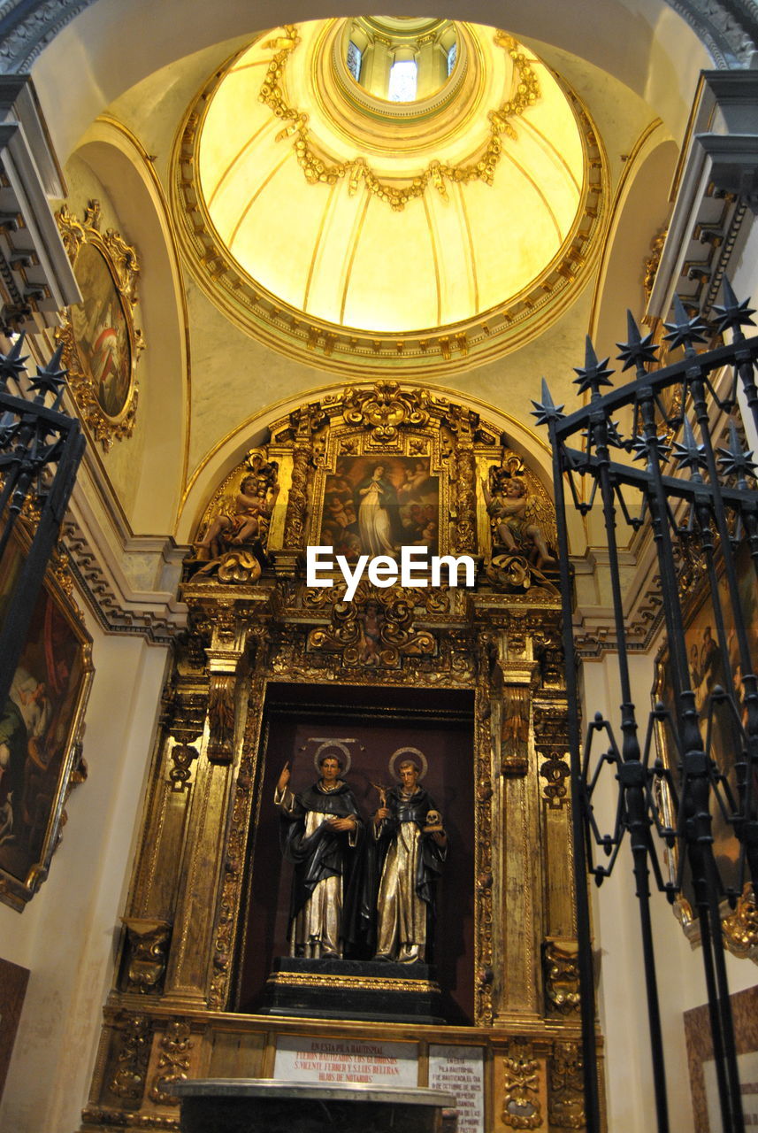 LOW ANGLE VIEW OF CHURCH WITH CEILING