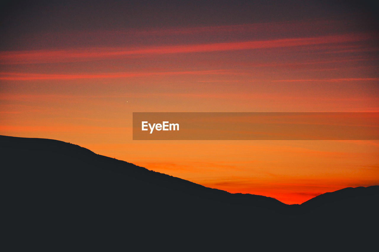 View of mountains at sunset