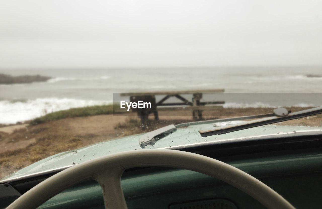Stormy sea seen through windshield