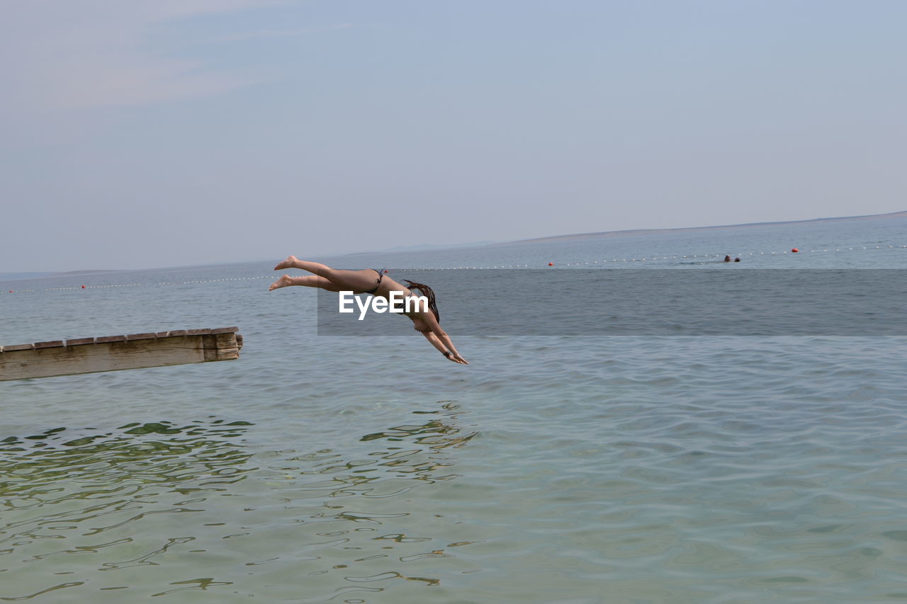 VIEW OF SEA AGAINST THE SKY