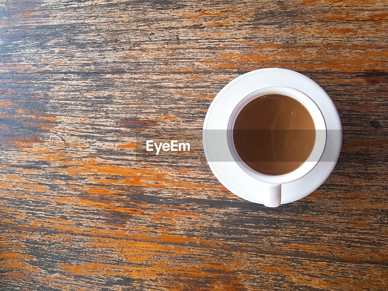 HIGH ANGLE VIEW OF COFFEE CUP