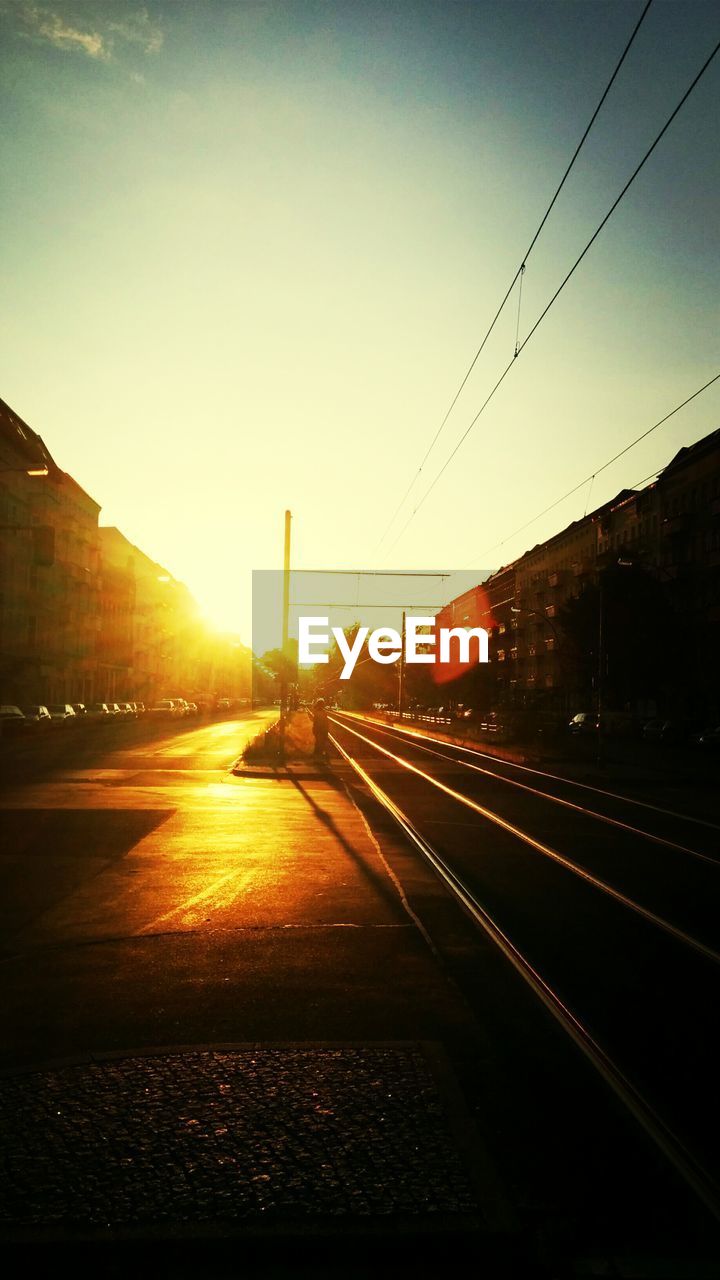 Urban tram stop in sunlight