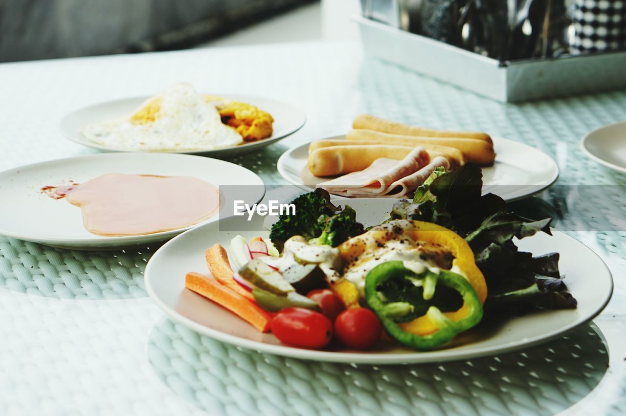 Close-up of breakfast served on table