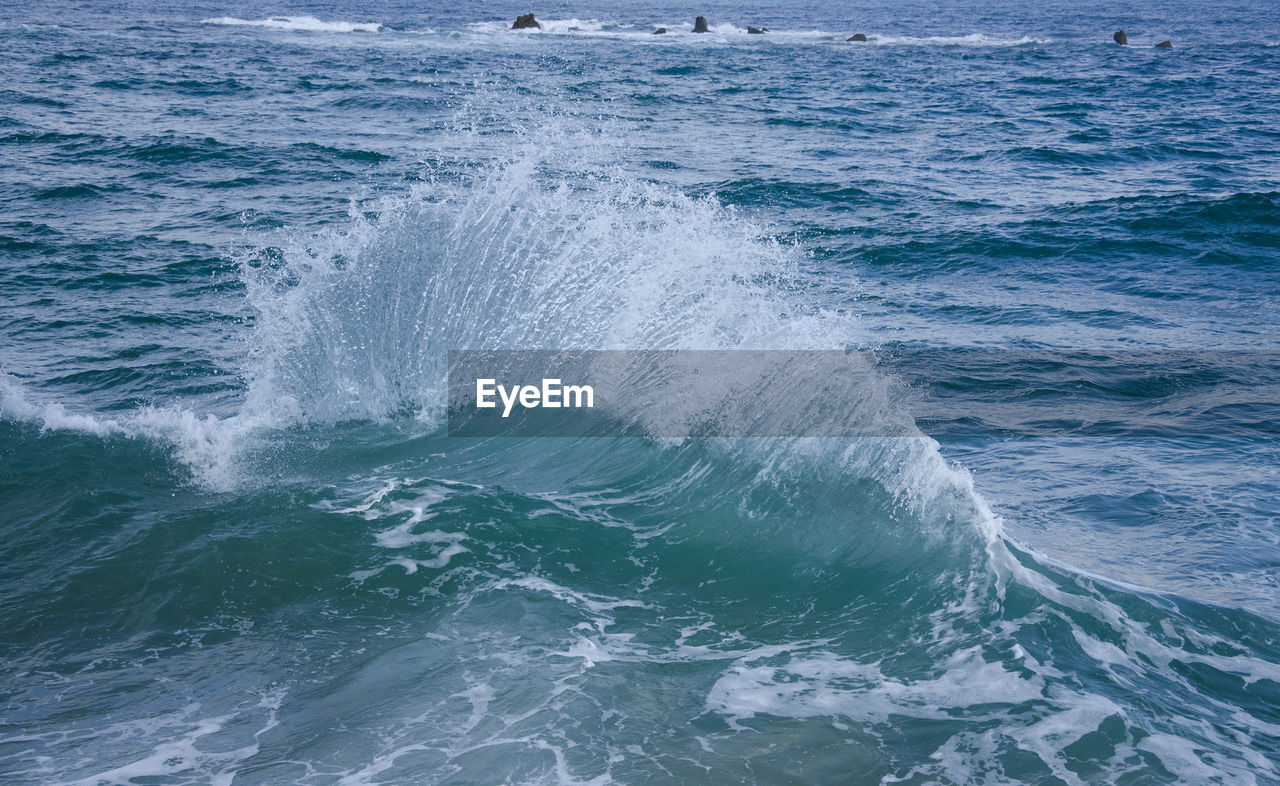 Waves splashing on sea