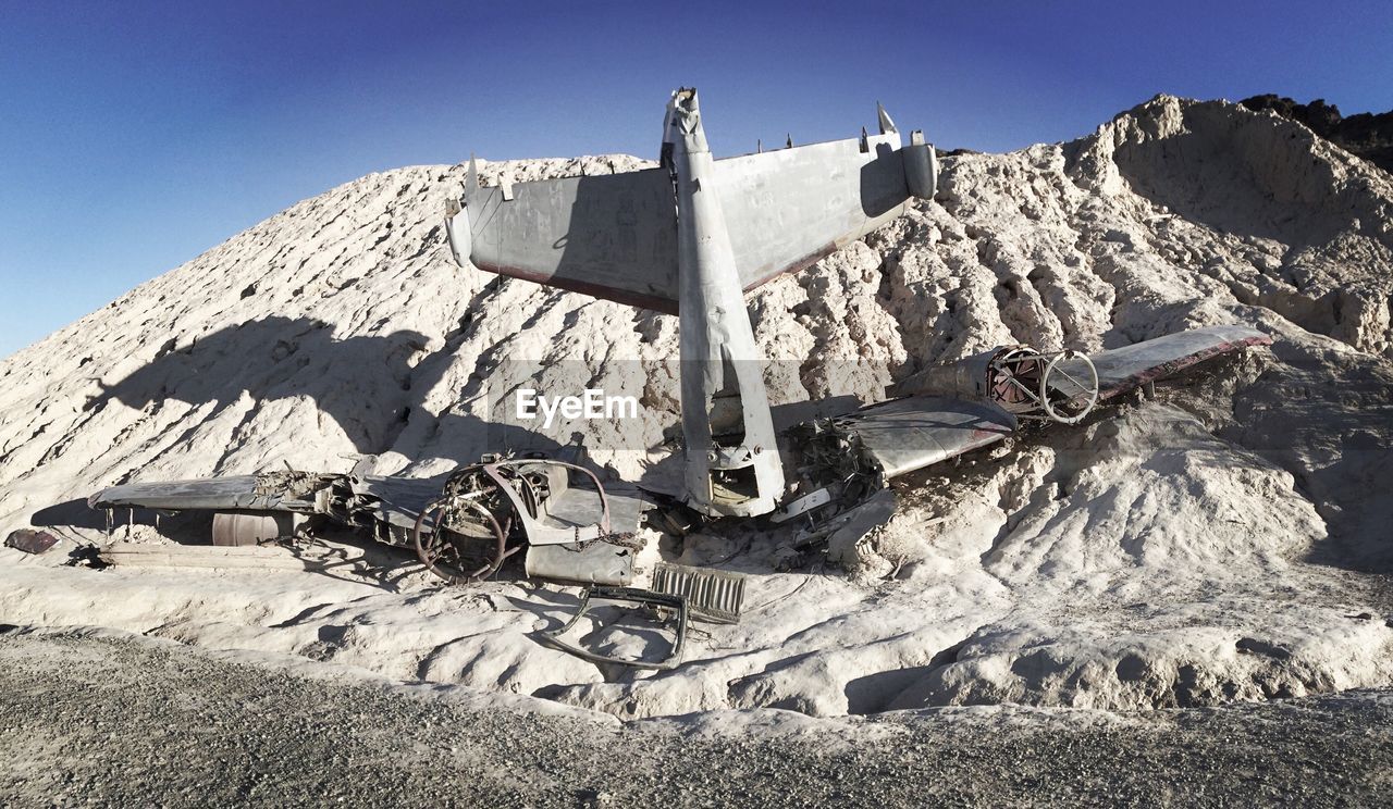 Airplane crash in nevada desert on sunny day